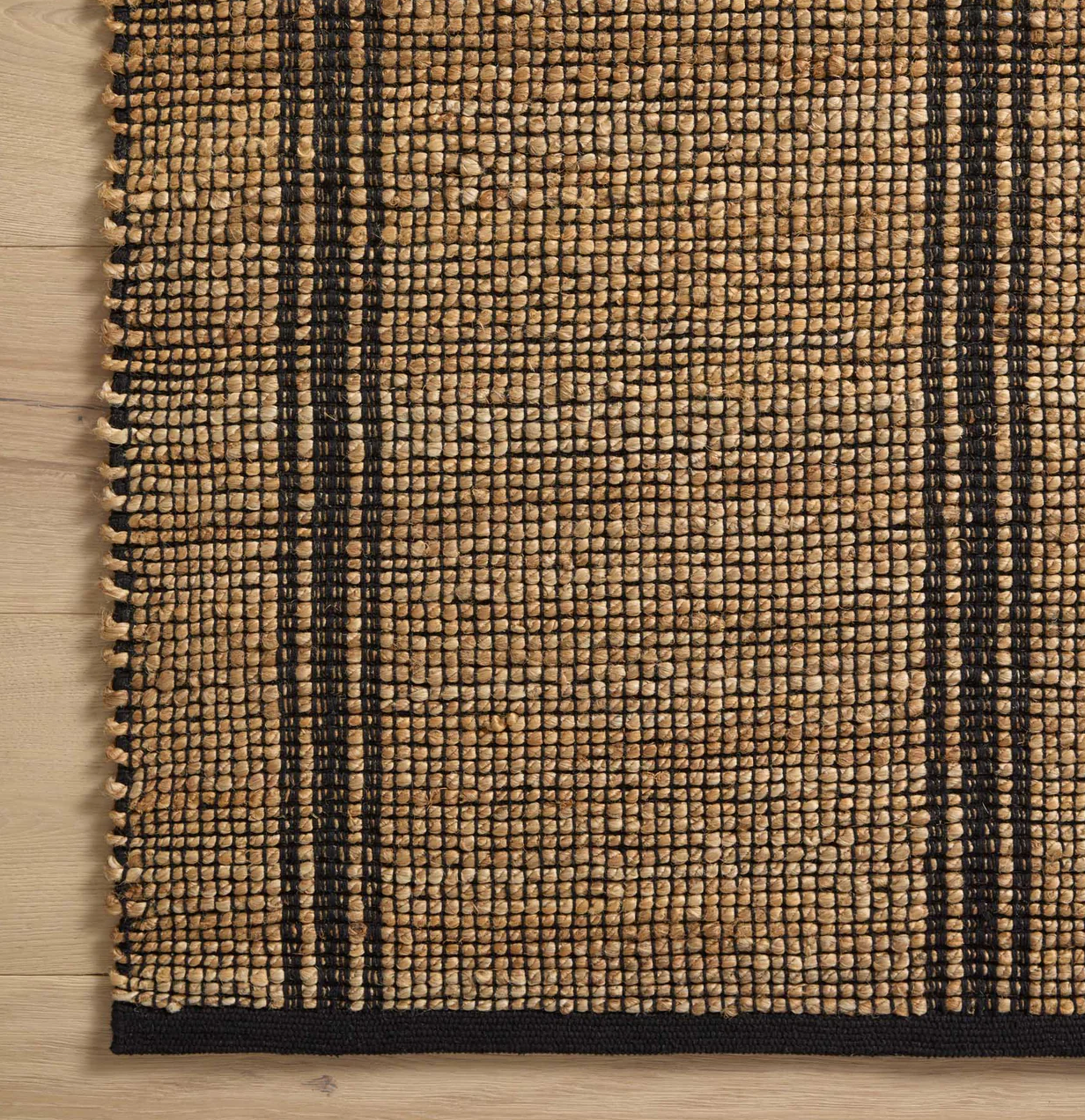 Explore Linear Designs with Colton Natural/Black Collection at $239.00